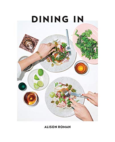 Cookbook cover with food photography, hands, and the title "Dining In" by Alison Roman.