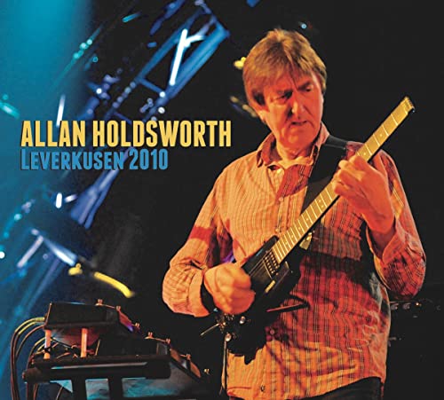 Allan Holdsworth playing a guitar on stage, Leverkusen 2010 album cover.