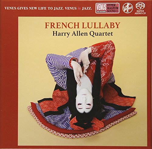 CD cover: woman in blue and red patterned clothing, resting on pillows.
