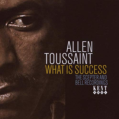 Allen Toussaint's album cover: close-up face with text overlay on dark background.