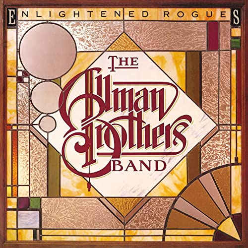 Stained glass artwork featuring the Allman Brothers Band logo on a diamond-shaped background.