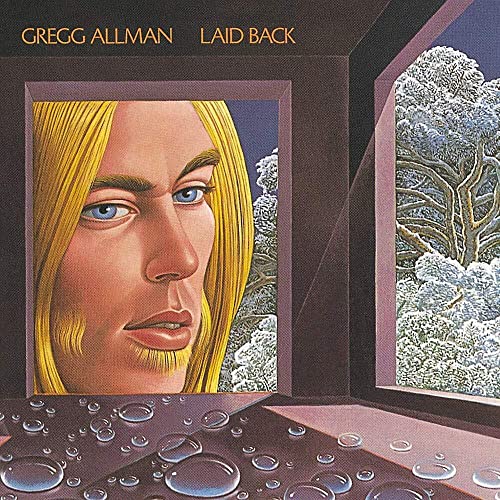 Gregg Allman album cover, “Laid Back,” featuring a portrait and winter scene.