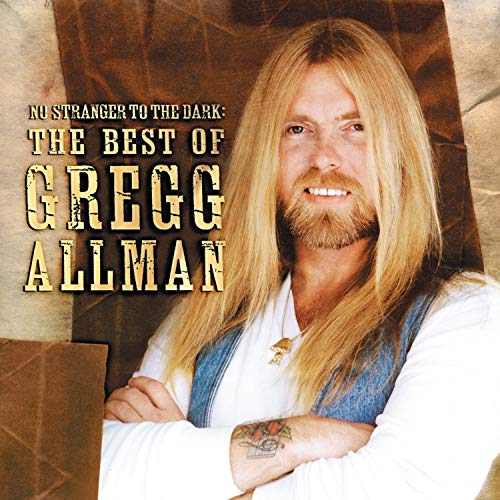 Gregg Allman with long blonde hair and a beard on a music album cover.