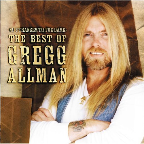 "CD cover featuring Gregg Allman with long blonde hair and a white shirt."