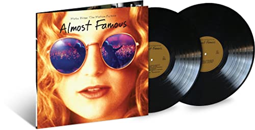 Almost Famous" 20th Anniversary vinyl record with woman wearing sunglasses on cover.