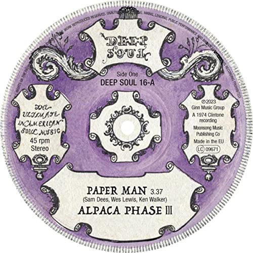 Purple vinyl record label for Alpaca Phase III's Paper Man with decorative white frames.