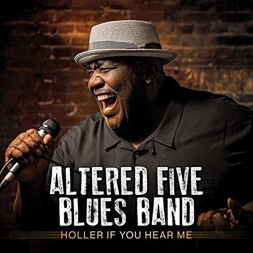 Man singing into a microphone, album cover for Altered Five Blues Band.