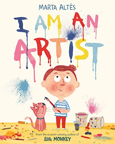 A young boy and a cat stand surrounded by paint splatters and art supplies.