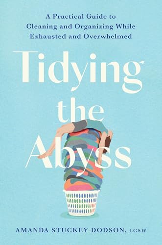 Book cover showing a person slumped over a tall, overflowing laundry basket.