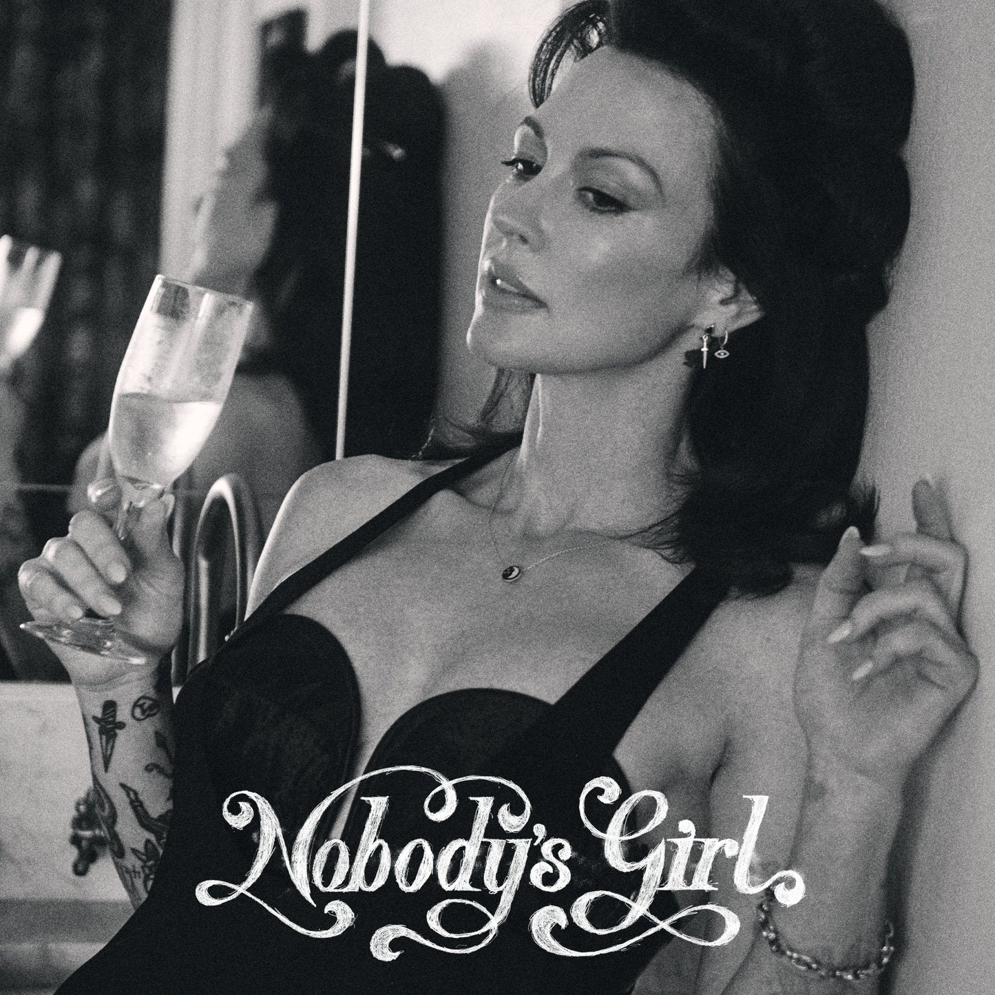 Black and white portrait of Amanda Shires holding a drink, album title below.