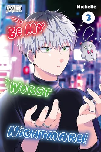Manga cover featuring a young man with silver hair and a cartoon ghost.