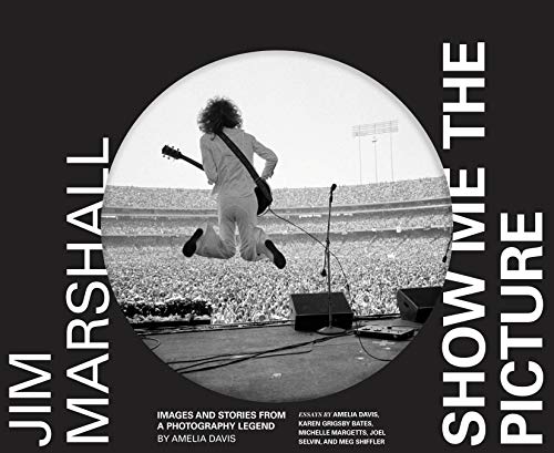 Book cover: Jim Marshall photography collection, guitarist leaping on stage.
