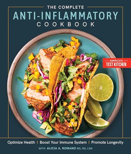 Cookbook cover featuring fish tacos with avocado, lime, and colorful toppings.