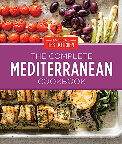 Cookbook cover featuring grilled skewers, olives, and the title “The Complete Mediterranean.”