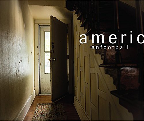 Vinyl album cover with a doorway and staircase in muted tones.