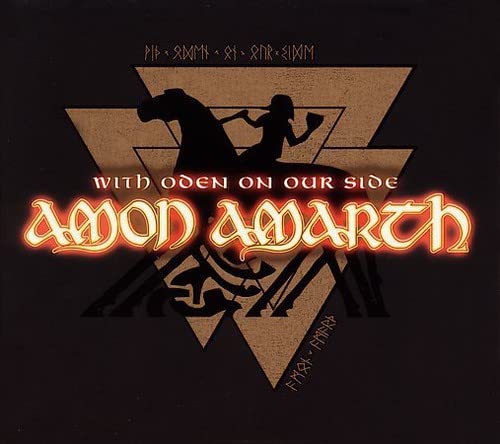 Amon Amarth album cover: Viking figures within a geometric, dark design.
