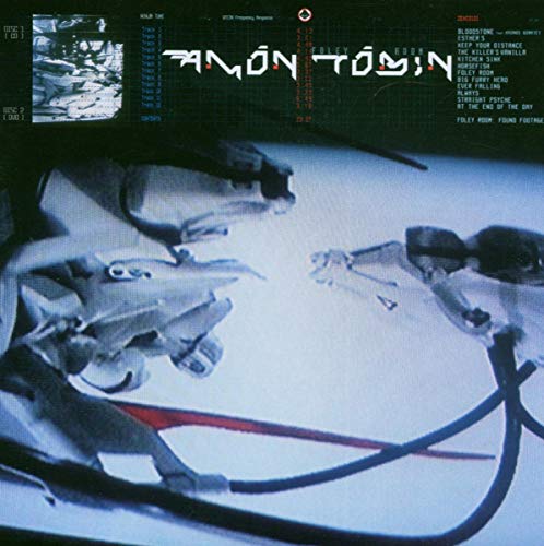 CD cover for Amon Tobin's "The Foley Room" featuring robotic arms.