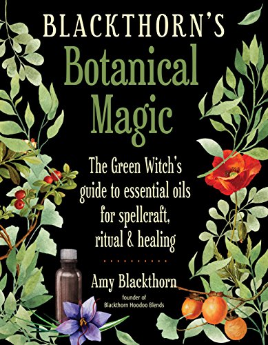 Book cover with botanical illustrations, dark background, and essential oil bottles.