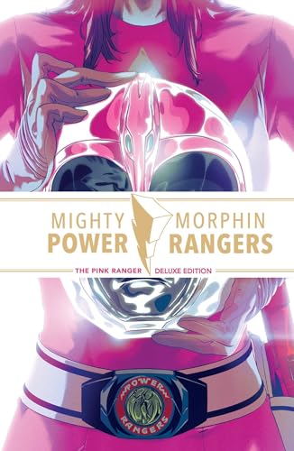 Pink Power Ranger helmet held by hands, book title visible below.