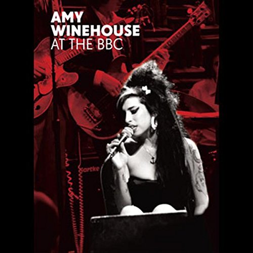 Amy Winehouse singing into a microphone, album cover for “At the BBC”.