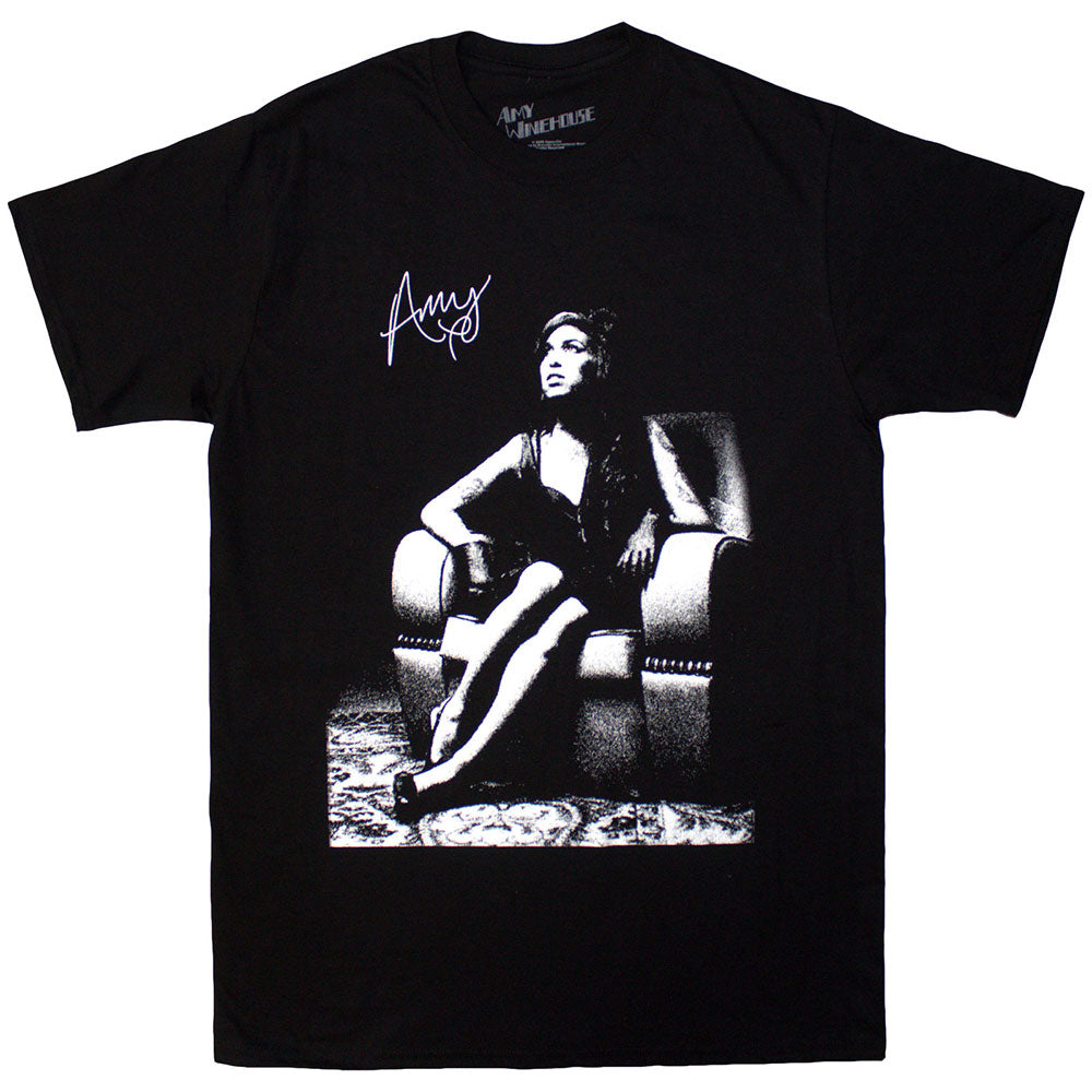 Black t-shirt featuring Amy Winehouse seated in a chair illustration.