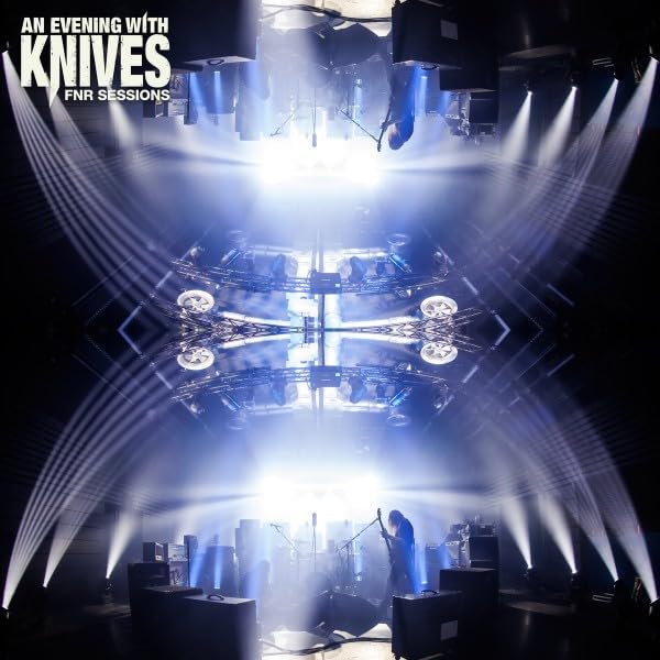 Album cover showing a mirrored concert stage with bright spotlights and a silhouette musician.