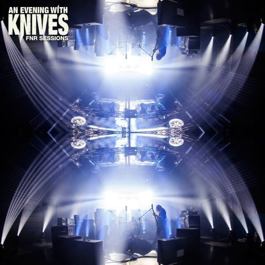 Album cover showing a mirrored concert stage with bright spotlights and a silhouette musician.