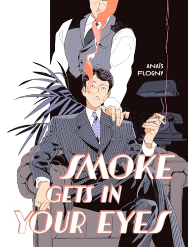 A man in a pinstripe suit sits in a chair while another stands behind him.