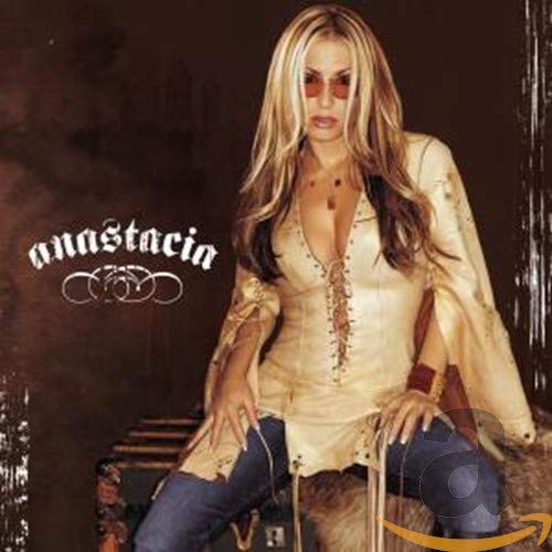 Anastacia album cover featuring the singer in a white top and jeans.
