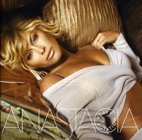 CD cover for Anastacia’s “Heavy Rotation” featuring a reclining blonde woman.