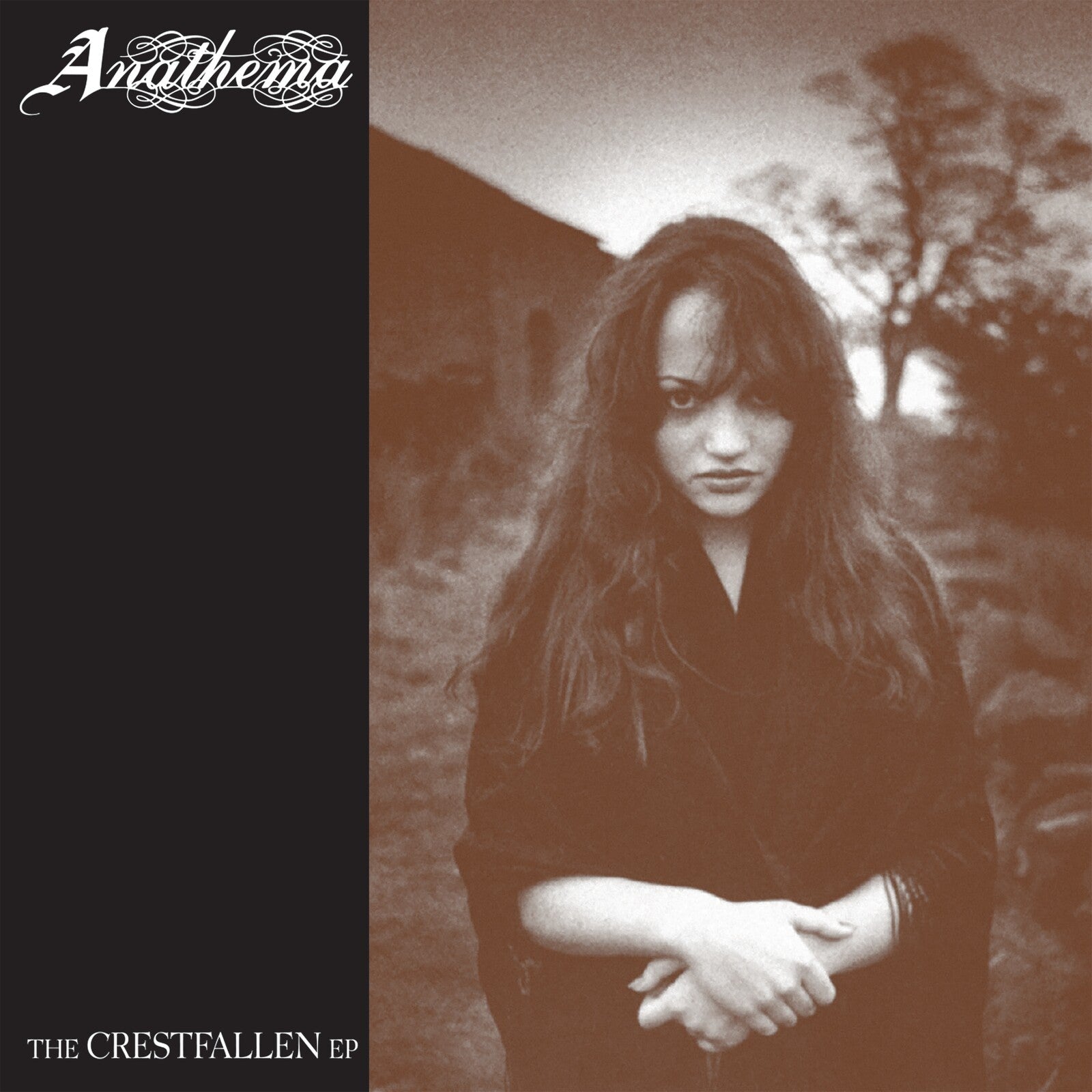 Anathema's "Crestfallen" CD cover: sepia-toned portrait of a woman.