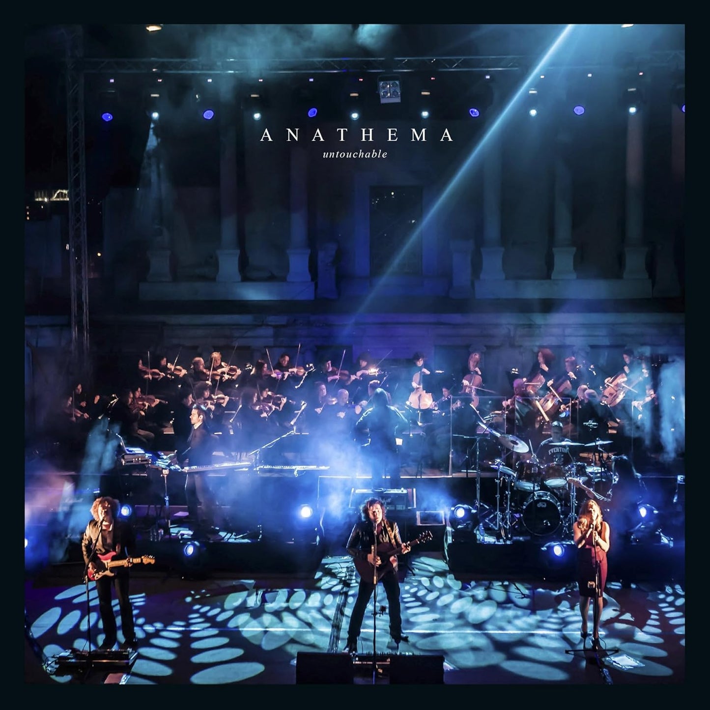 Anathema’s “Untouchable” vinyl cover: band performing on a stage with fog.