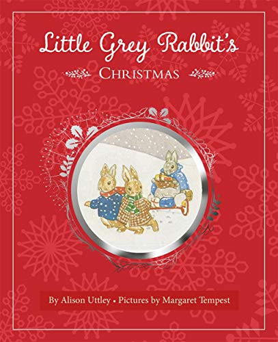 Book cover: three rabbits pulling a sled in the snow.
