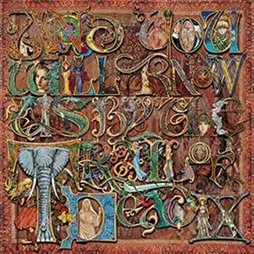 Intricate illuminated lettering and illustrations cover the album cover with an elephant graphic.