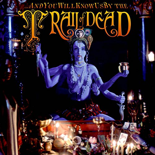 Album cover featuring a four-armed blue deity figure surrounded by candles and ritual objects.