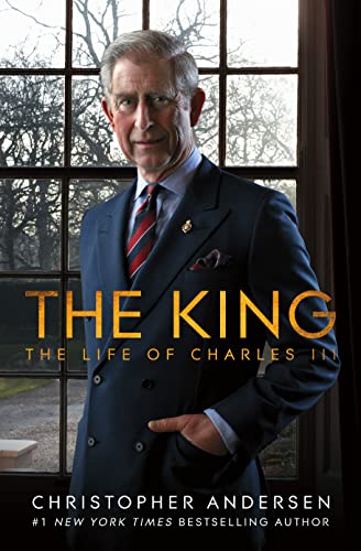 Book cover featuring a portrait of King Charles III in a navy blue suit.