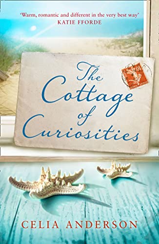 Book cover featuring a cottage, seashells, and a vintage postcard.