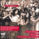 "CD cover with sepia-toned image of woman surrounded by crowd, titled 'Carmen: The Soundtrack'."