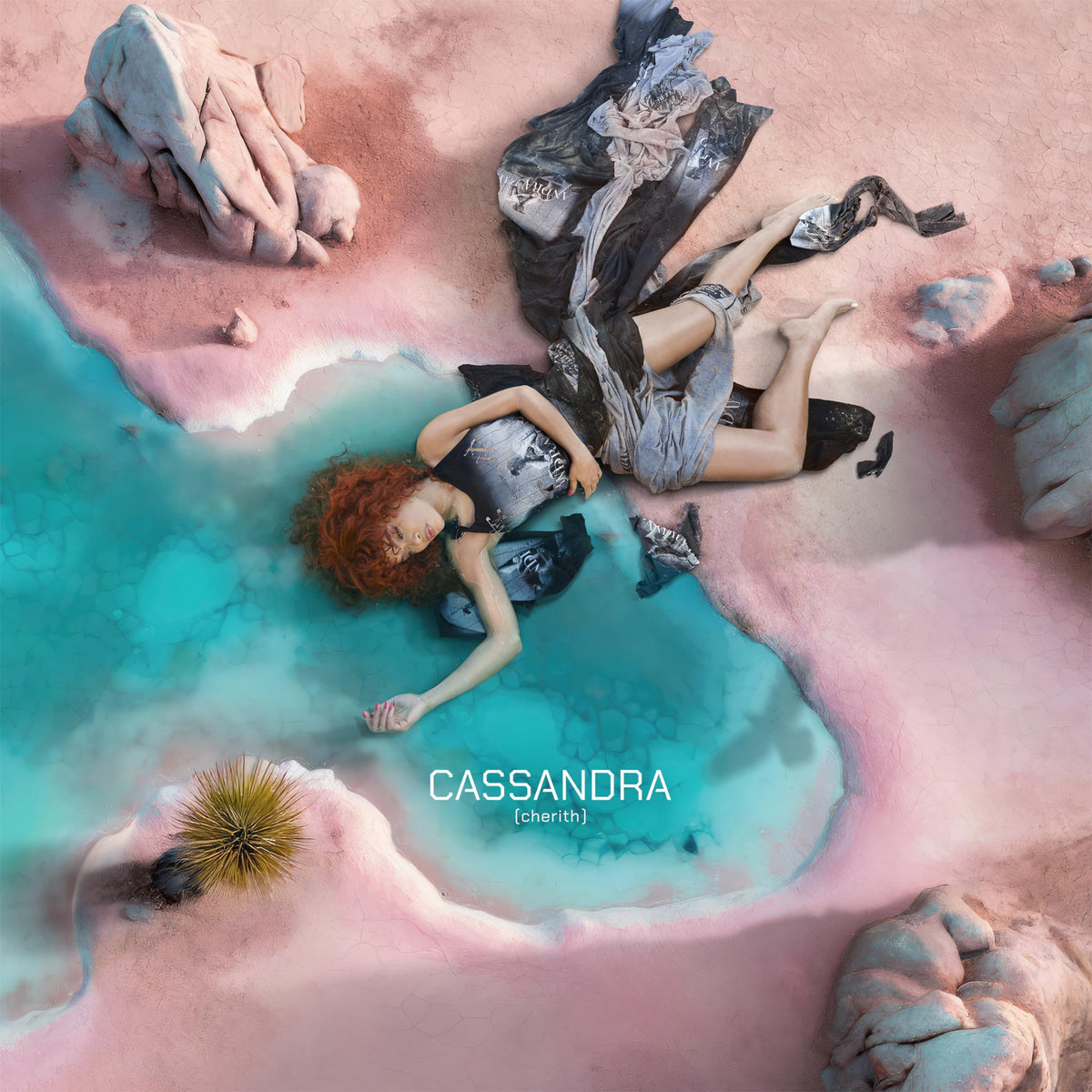 Album cover: Andra Day reclines in a surreal, textured blue landscape.