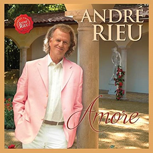DVD cover featuring Andre Rieu in a pink jacket, outdoors with a statue.