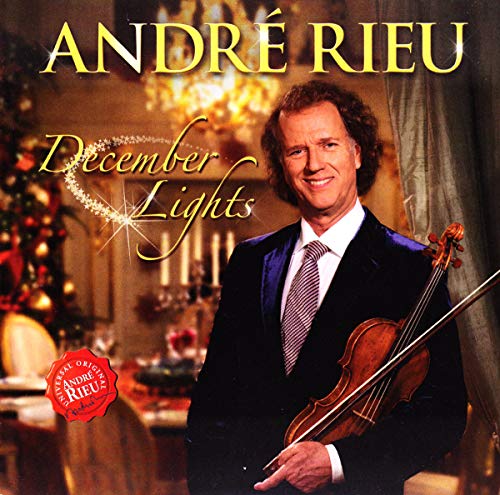 André Rieu holding a violin, album cover for “December Lights” CD.