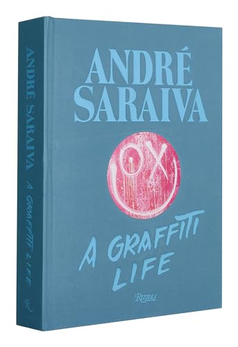 Blue book cover with artist’s name and pink graffiti-style “OX” symbol.
