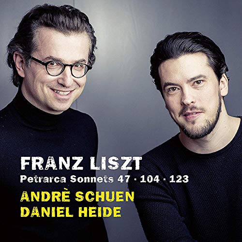 CD cover featuring two men in black shirts, with text overlay.