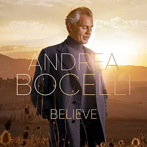 Andrea Bocelli album cover, “Believe,” with a portrait and golden landscape.
