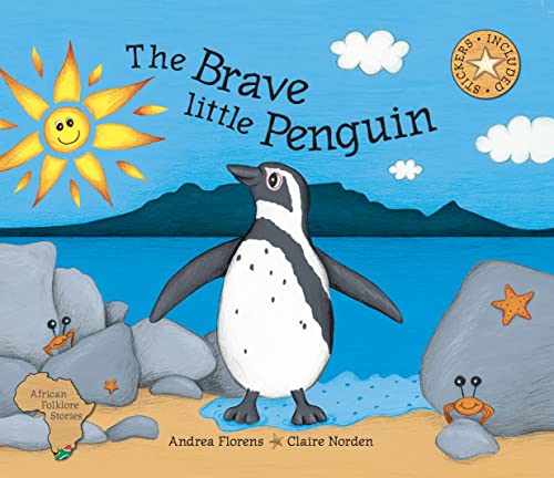 Penguin standing on a sandy beach with sun, rocks, and sea.