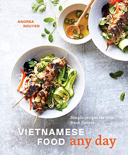 Book cover featuring bowls of grilled meat skewers with noodles, vegetables, and dipping sauce.
