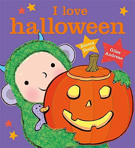 Child in monster costume hugs a smiling jack-o'-lantern.