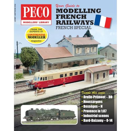 Book cover showing a model French railway station with a train and steam locomotive.