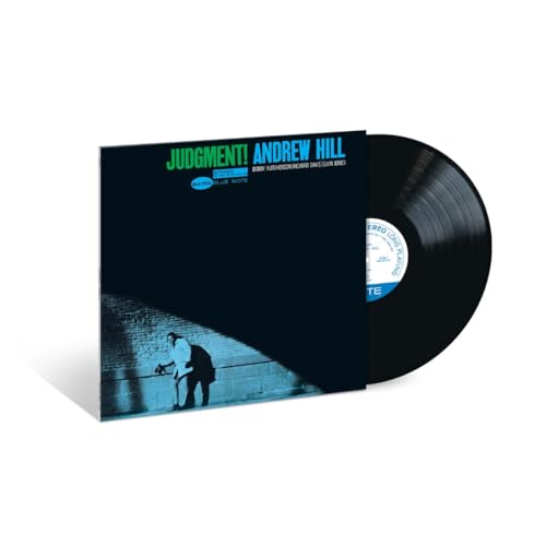 Andrew Hill's "Judgment!" vinyl record with a dark blue cover and figure.