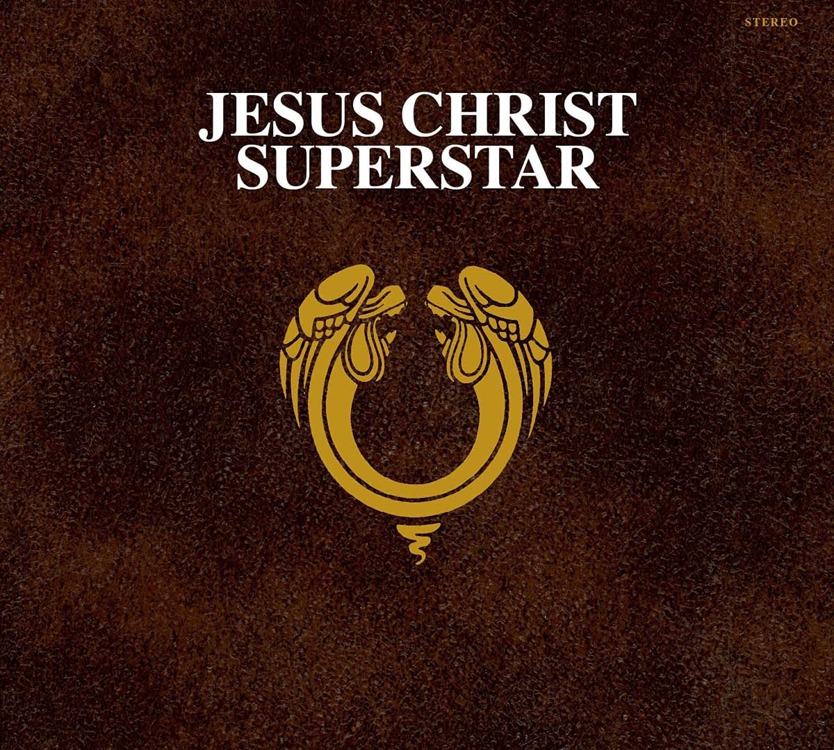 Jesus Christ Superstar album cover with a gold emblem on a brown textured background.